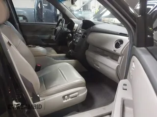 2012 Honda Pilot Touring with VIN 5FNYF4H91CB067014, listed as a IAAI auction lot 41749402 with 151,248 mi miles. Bid and sale history available at carsss.com. Image 5.