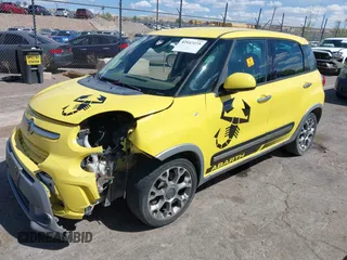 2014 FIAT 500L Trekking z VIN ZFBCFADH7EZ021466, wystawiony jako IAAI lot #42147275 z przebiegiem 132 380 mil mil oraz . Historia ofert i sprzedaży dostępna na DreamBid. Obrazek 2.