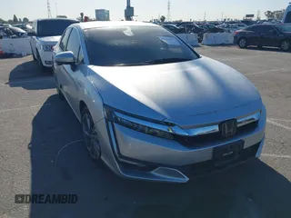 2019 Honda Clarity Touring z VIN JHMZC5F38KC003399, wystawiony jako IAAI lot #41818175 z przebiegiem 54 896 mil mil oraz . Historia ofert i sprzedaży dostępna na DreamBid. Obrazek 1.