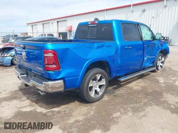 2021 Ram 1500 Laramie with VIN 1C6SRFJT1MN774879, listed as a IAAI auction lot 42242318 with 51,971 mi miles and . Bid and sale history available at DreamBid. Image 4.
