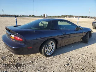 2000 Chevrolet Camaro Z28 z VIN 2G1FP22G3Y2123001, wystawiony jako Copart lot #85730994 z przebiegiem 32 579 mil mil oraz Szkoda całkowita • Salvage title. Historia ofert i sprzedaży dostępna na DreamBid. Obrazek 3.