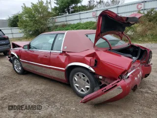 2002 Cadillac Eldorado z VIN 1G6EL12Y82B102243, wystawiony jako Copart lot #72717014 z przebiegiem 165 442 mil mil oraz Czysty tytuł • Clean title. Historia ofert i sprzedaży dostępna na DreamBid. Obrazek 2.