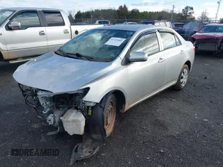 2009 Toyota Corolla with VIN 2T1BU40E09C150287, listed as a IAAI auction lot 41729482 with 103,712 mi miles. Bid and sale history available at carsss.com. Image 2.