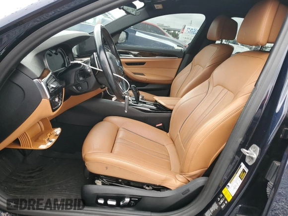 2017 BMW 5 Series 530i xDrive with VIN WBAJA7C3XHWA70310, listed as a Copart auction lot 52139025 with 56,498 mi miles and Clean Title. Bid and sale history available at carsss.com. Image 7.