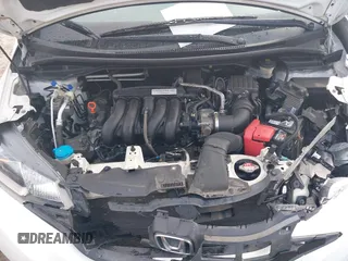 2015 Honda Fit LX with VIN 3HGGK5H51FM752870, listed as a IAAI auction lot 42378020 with 109,698 mi miles and . Bid and sale history available at DreamBid. Image 10.