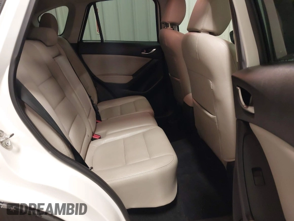 2014 Mazda CX-5 Grand Touring with VIN JM3KE4DY3E0374036, listed as a IAAI auction lot 41889030 with 162,611 mi miles and . Bid and sale history available at DreamBid. Image 8.