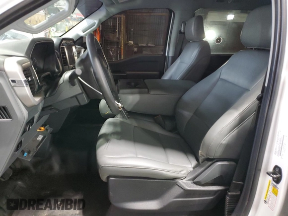 2022 Ford F-150 XL with VIN 1FTFW1E57NKD28966, listed as a Copart auction lot 55878125 with 77,121 mi miles and Salvage title. Bid and sale history available at DreamBid. Image 7.