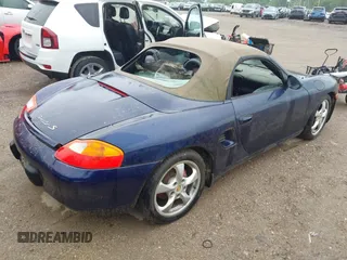2002 Porsche Boxster z VIN WP0CA29822U622397, wystawiony jako IAAI lot #42368183 z przebiegiem 189 696 mil mil oraz . Historia ofert i sprzedaży dostępna na DreamBid. Obrazek 4.