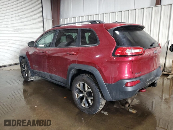 2015 Jeep Cherokee Trailhawk with VIN 1C4PJMBB8FW576765, listed as a Copart auction lot 49097925 with 299,877 mi miles and Clean Title. Bid and sale history available at DreamBid. Image 2.