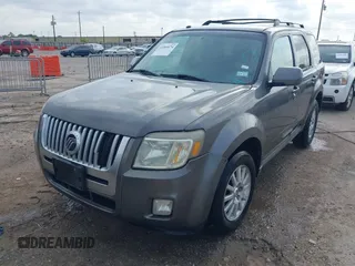 2011 Mercury Mariner Premier with VIN 4M2CN8HG3BKJ07656, listed as a IAAI auction lot 42369474 with 250,352 mi miles and . Bid and sale history available at DreamBid. Image 2.