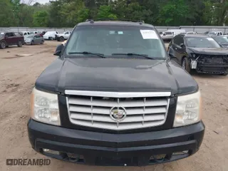 2005 Cadillac Escalade with VIN 1GYEC63TX5R203156, listed as a IAAI auction lot 41937137 with 239,919 mi miles. Bid and sale history available at carsss.com. Image 6.