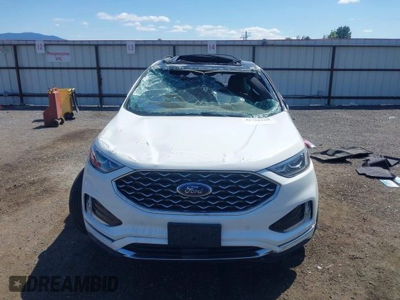 2020 Ford Edge Titanium z VIN 2FMPK4K96LBB46218, wystawiony jako IAAI lot #42750160 z przebiegiem 56 720 mil mil oraz . Historia ofert i sprzedaży dostępna na DreamBid. Obrazek 13.