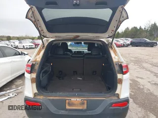 2016 Jeep Cherokee Limited z VIN 1C4PJMDS6GW182082, wystawiony jako IAAI lot #41943408 z przebiegiem 141 796 mil mil oraz . Historia ofert i sprzedaży dostępna na DreamBid. Obrazek 17.