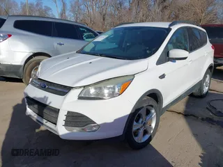 2013 Ford Escape SE with VIN 1FMCU9GXXDUB02618, listed as a IAAI auction lot 41734363 with 198,264 mi miles. Bid and sale history available at carsss.com. Image 2.