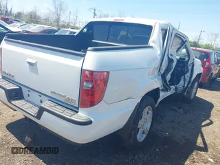 2009 Honda Ridgeline RTL with VIN 5FPYK16529B107871, listed as a IAAI auction lot 42049833 with 141,214 mi miles. Bid and sale history available at carsss.com. Image 4.
