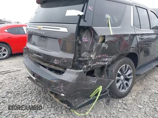 2021 Chevrolet Tahoe LT with VIN 1GNSCNKD7MR439900, listed as a IAAI auction lot 41187590 with 119,131 mi miles and . Bid and sale history available at DreamBid. Image 6.