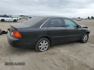 2000 Toyota Avalon XL with VIN 4T1BF28B4YU105732, listed as a Copart auction lot 54752665 with 143,855 mi miles and Salvage Title. Bid and sale history available at DreamBid. Image 3.