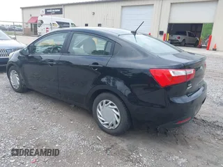 2013 Kia Rio LX with VIN KNADM4A35D6270556, listed as a IAAI auction lot 42115208 with 165,249 mi miles. Bid and sale history available at carsss.com. Image 3.