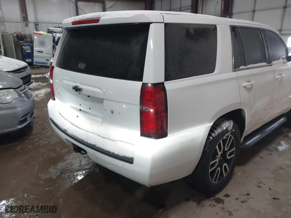 2015 Chevrolet Tahoe Commercial with VIN 1GNSK2EC8FR722684, listed as a IAAI auction lot 41553558 with 119,434 mi miles. Bid and sale history available at carsss.com. Image 4.