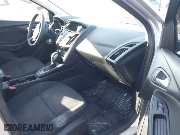 2015 Ford Focus SE with VIN 1FADP3F20FL355058, listed as a IAAI auction lot 41666337 with 144,887 mi miles. Bid and sale history available at carsss.com. Image 5.