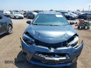 2016 Toyota Corolla L with VIN 5YFBURHE4GP427800, listed as a IAAI auction lot 42182439 with 99,529 mi miles and . Bid and sale history available at DreamBid. Image 6.