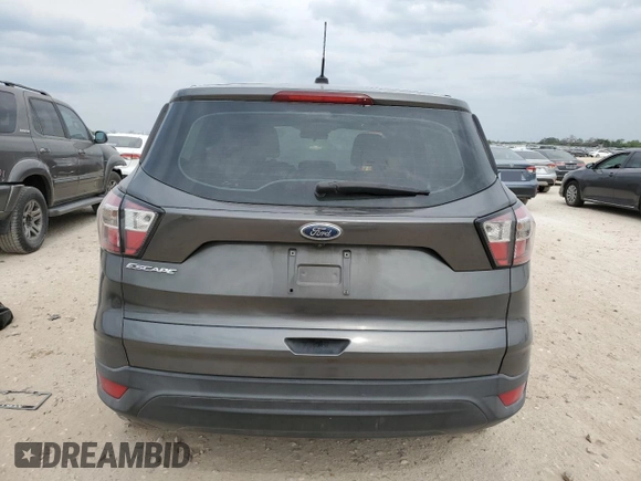 2017 Ford Escape S with VIN 1FMCU0F73HUB79818, listed as a Copart auction lot 53877285 with 108,029 mi miles and Salvage title. Bid and sale history available at DreamBid. Image 6.