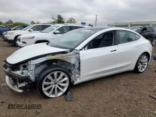 2020 Tesla Model 3 Long Range z VIN 5YJ3E1EB3LF667522, wystawiony jako Copart lot #57421145 z przebiegiem 77 821 mil mil oraz Szkoda całkowita • Salvage title. Historia ofert i sprzedaży dostępna na DreamBid. Obrazek 1.