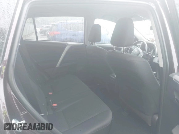 2018 Toyota RAV4 LE with VIN 2T3BFREV9JW857284, listed as a IAAI auction lot 42448480 with 85,551 mi miles and . Bid and sale history available at DreamBid. Image 8.