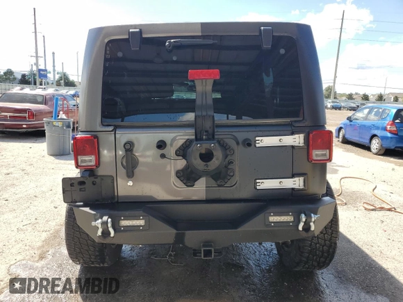 2018 Jeep Wrangler JK Unlimited Sport S with VIN 1C4BJWDG7JL814226, listed as a Copart auction lot 72442484 with 49,658 mi miles and Salvage Title. Bid and sale history available at carsss.com. Image 6.