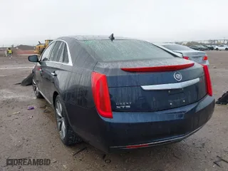 2013 Cadillac XTS with VIN 2G61N5S38D9163214, listed as a IAAI auction lot 41172272 with 167,309 mi miles. Bid and sale history available at carsss.com. Image 3.