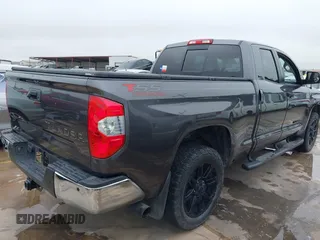 2019 Toyota Tundra SR with VIN 5TFRM5F13KX134892, listed as a IAAI auction lot 42354219 with 47,543 mi miles and . Bid and sale history available at DreamBid. Image 4.