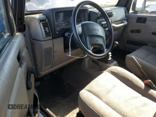 2003 Jeep Wrangler X z VIN 1J4FA39S43P338732, wystawiony jako Copart lot #56315495 z przebiegiem 135 480 mil mil oraz Szkoda całkowita • Salvage title. Historia ofert i sprzedaży dostępna na DreamBid. Obrazek 8.