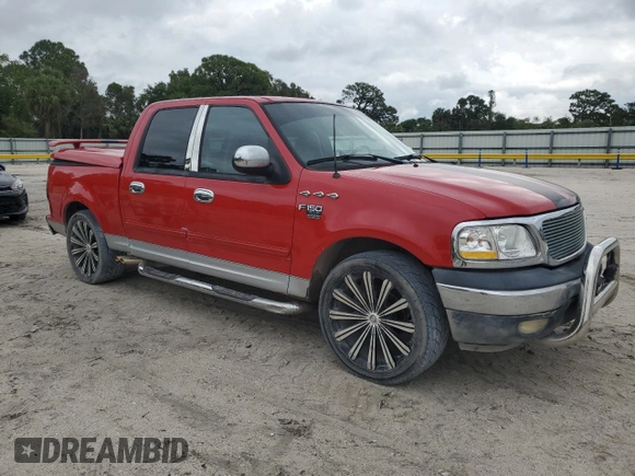 2003 Ford F-150 XLT with VIN 1FTRW07643KB48614, listed as a Copart auction lot 51895905 with 157,290 mi miles and Salvage Title. Bid and sale history available at carsss.com. Image 4.