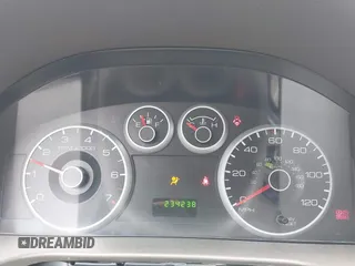 2006 Ford Fusion S with VIN 3FAFP06Z56R114621, listed as a IAAI auction lot 41901022 with 234,238 mi miles. Bid and sale history available at carsss.com. Image 7.