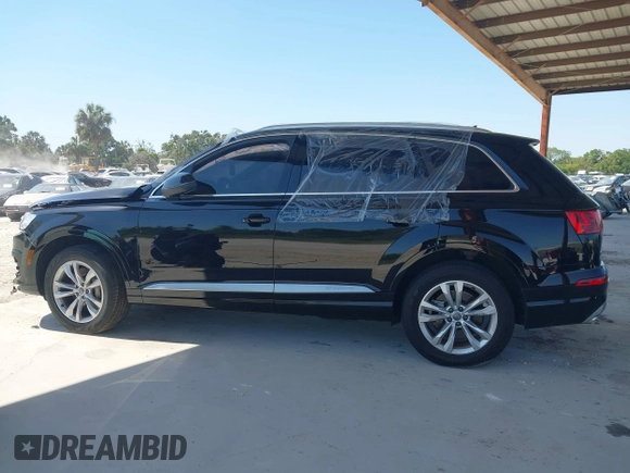 2017 Audi Q7 Premium Plus with VIN WA1LHAF75HD040203, listed as a IAAI auction lot 42064687 with 100,845 mi miles and . Bid and sale history available at DreamBid. Image 14.