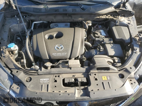 2014 Mazda CX-5 Grand Touring with VIN JM3KE4DY1E0328852, listed as a Copart auction lot 53965265 with 67,242 mi miles and Salvage Title. Bid and sale history available at DreamBid. Image 12.