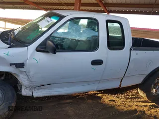 2002 Ford F-150 XL z VIN 1FTRX18L32NB45367, wystawiony jako IAAI lot #42618680 z przebiegiem 333 051 mil mil oraz . Historia ofert i sprzedaży dostępna na DreamBid. Obrazek 14.