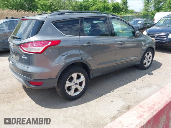 2014 Ford Escape SE with VIN 1FMCU0G98EUB23109, listed as a IAAI auction lot 42186287 with 134,793 mi miles. Bid and sale history available at carsss.com. Image 4.