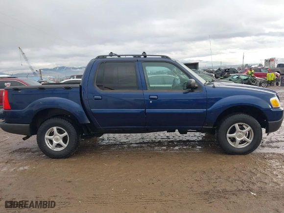 2004 Ford Explorer Sport Trac XLS with VIN 1FMZU77KX4UC21188, listed as a IAAI auction lot 41135185 with 194,607 mi miles. Bid and sale history available at carsss.com. Image 14.