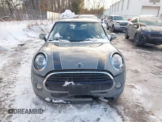 2019 MINI Hardtop Cooper with VIN WMWXP5C52K2H91038, listed as a IAAI auction lot 41509304 with 77,123 mi miles and . Bid and sale history available at DreamBid. Image 12.