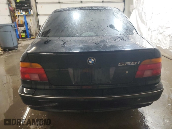 2000 BMW 5 Series 528iA with VIN WBADM6342YGU16431, listed as a Copart auction lot 45346575 with 99,799 mi miles and Salvage Title. Bid and sale history available at carsss.com. Image 6.