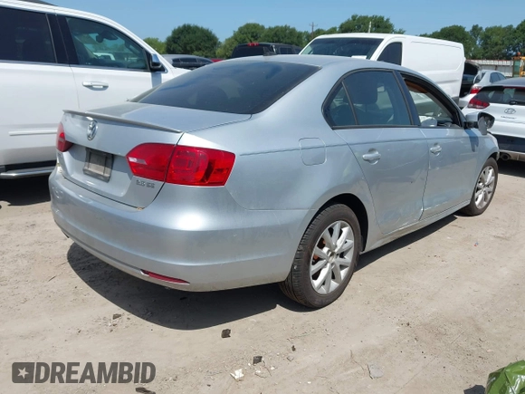 2012 Volkswagen Jetta SE with VIN 3VWBP7AJXCM340937, listed as a IAAI auction lot 42526373 with 157,113 mi miles and . Bid and sale history available at DreamBid. Image 4.
