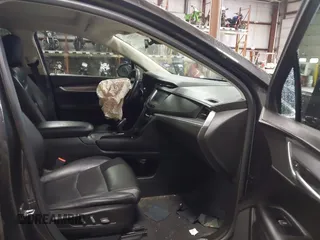 2018 Cadillac XT5 Luxury FWD with VIN 1GYKNCRS8JZ184322, listed as a IAAI auction lot 41225319 with 97,729 mi miles and . Bid and sale history available at carsss.com. Image 5.