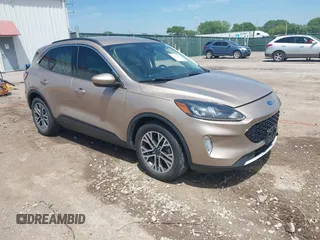 2020 Ford Escape SEL z VIN 1FMCU0H69LUB23895, wystawiony jako IAAI lot #42266341 z przebiegiem 88 773 mil mil oraz . Historia ofert i sprzedaży dostępna na DreamBid. Obrazek 1.