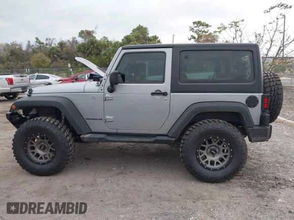 2014 Jeep Wrangler Sport with VIN 1C4AJWAG0EL265409, listed as a IAAI auction lot 41726935 with 78,547 mi miles and . Bid and sale history available at DreamBid. Image 15.