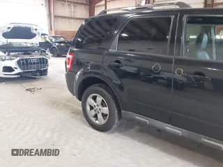 2010 Ford Escape Limited with VIN 1FMCU9E70AKD30170, listed as a IAAI auction lot 42564107 with 141,959 mi miles and . Bid and sale history available at DreamBid. Image 12.