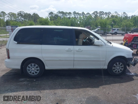 2005 Kia Sedona LX with VIN KNDUP132056702484, listed as a IAAI auction lot 42099572 with 195,528 mi miles and . Bid and sale history available at DreamBid. Image 13.