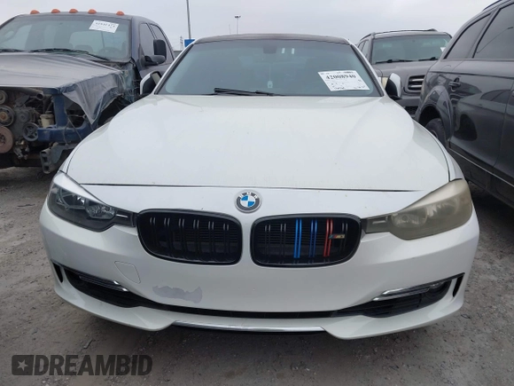 2012 BMW 3 Series 328i with VIN WBA3A5C50CF342206, listed as a IAAI auction lot 42008940 with 130,164 mi miles. Bid and sale history available at carsss.com. Image 6.