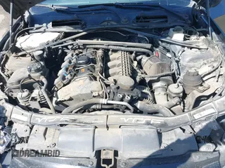 2007 BMW 3 Series 335i with VIN WBAWL73517PX49275, listed as a IAAI auction lot 41654471 with 203,928 mi miles. Bid and sale history available at carsss.com. Image 10.
