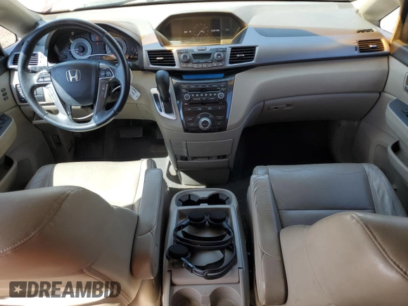2012 Honda Odyssey Touring with VIN 5FNRL5H90CB076810, listed as a Copart auction lot 53124915 with 178,316 mi miles and Salvage Title. Bid and sale history available at DreamBid. Image 8.